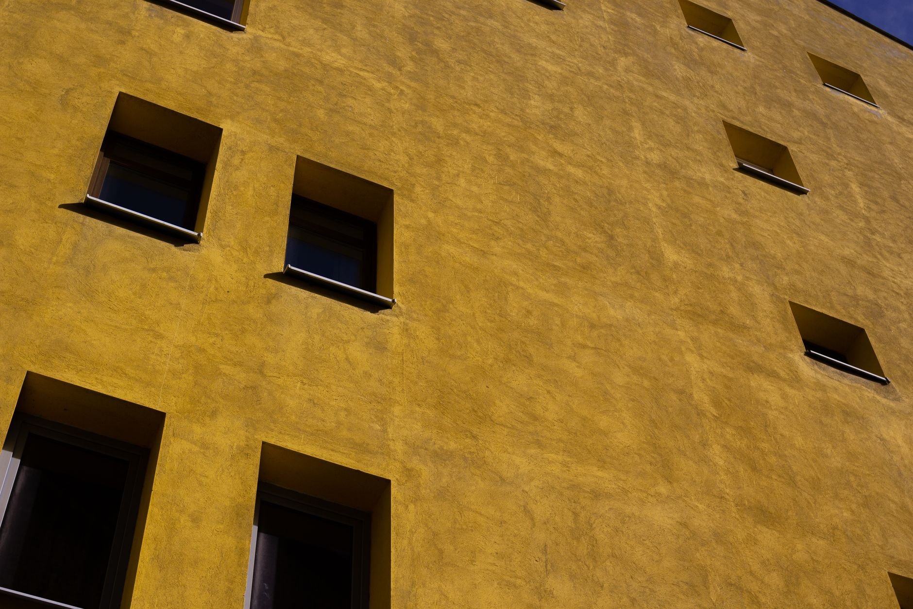 Modern architecture building facade with geometric window grid